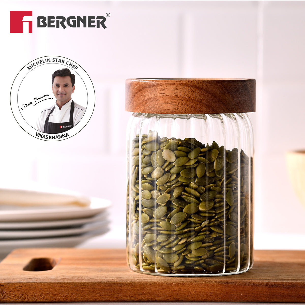 Bergner Acadia 900ml stripe borosilicate glass jar with solid acacia wood lid storing pumpkin seeds, endorsed by Michelin Star Chef Vikas Khanna
