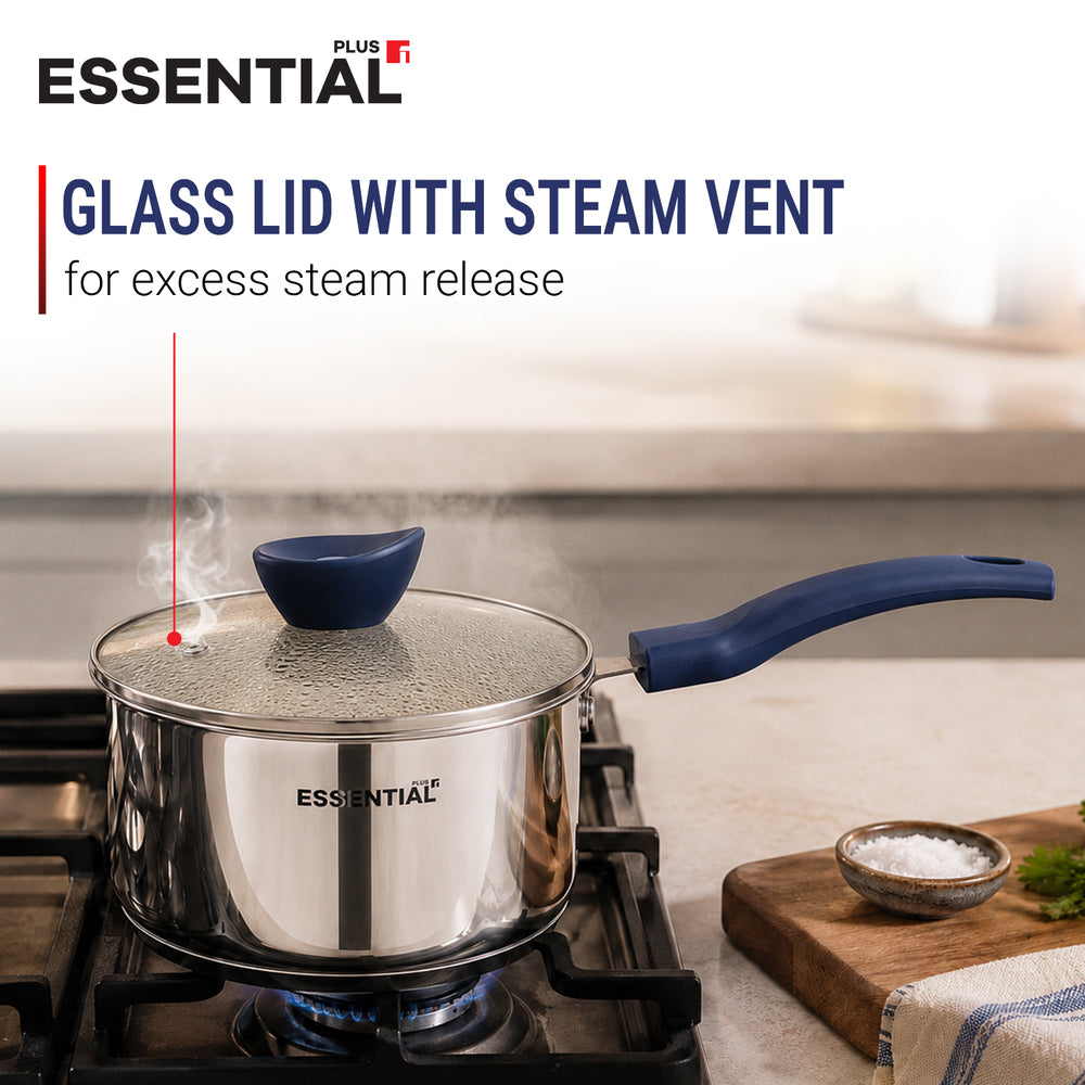 A stainless steel saucepan with a glass lid and blue steam vent on a gas stovetop. The image includes text overlays explaining the steam vent feature and shows the ESSENTIAL Plus brand logo.