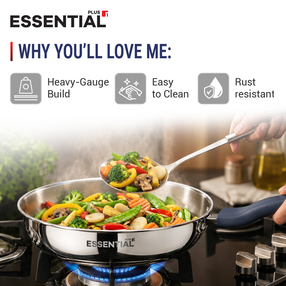 Essential Plus cookware featuring a stainless steel kadhai with a blue handle, shown cooking mixed vegetables on a gas stove. The image highlights a heavy-gauge build, easy-to-clean surface, and rust-resistant construction.