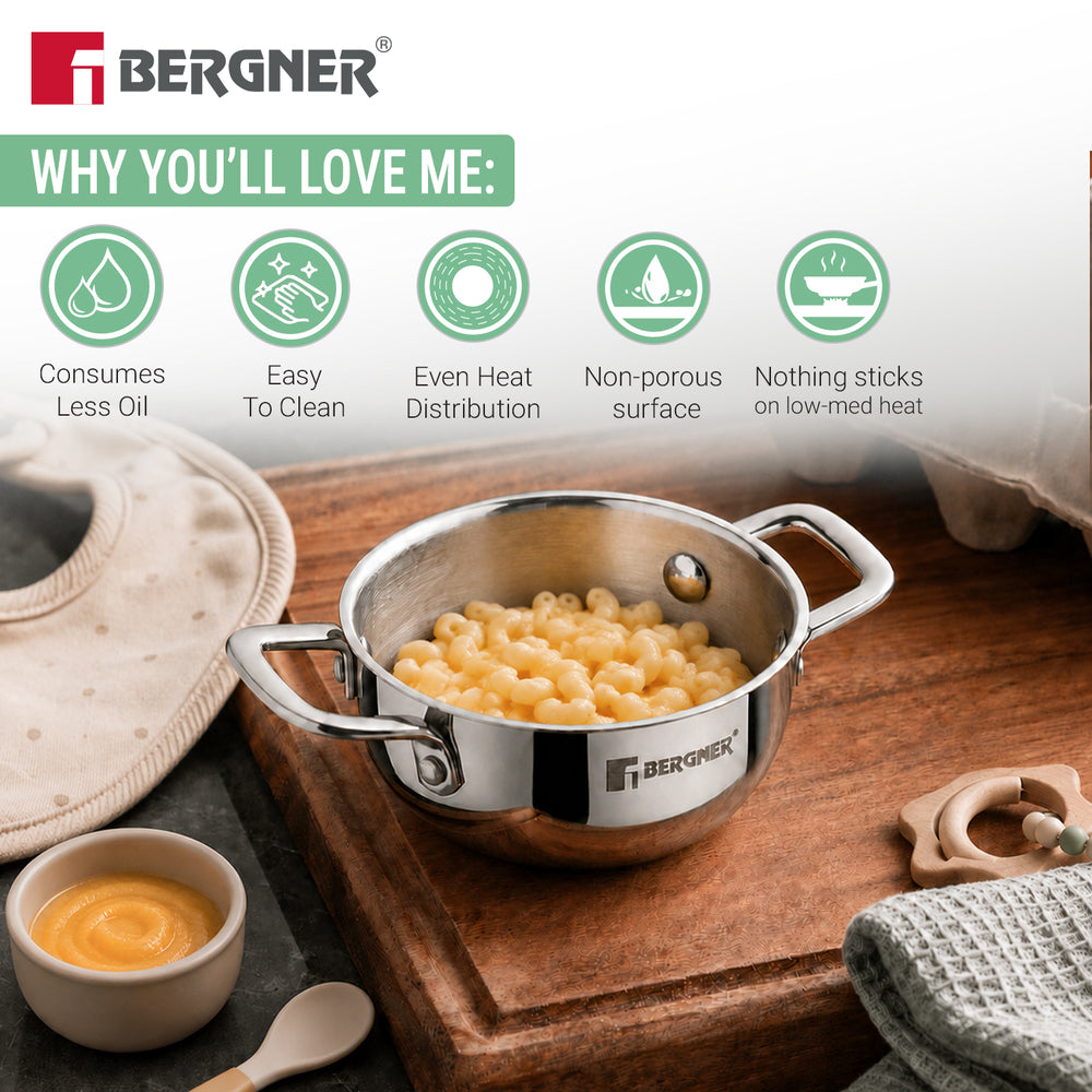 Bergner stainless steel baby saucepan with side handles, filled with macaroni pasta on a wooden cutting board, with product feature icons and text above.