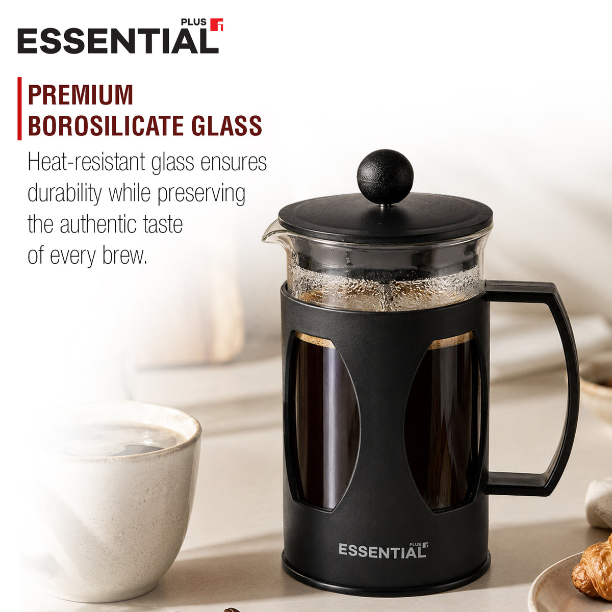 Bergner Essential Plus 600ml coffee plunger highlighting premium borosilicate heat-resistant glass beside steaming coffee mug