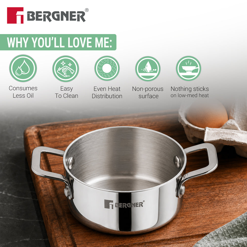 A Bergner stainless steel saucepan with side handles, shown on a wooden cutting board with an egg carton in the background. The top of the image features marketing text and icons highlighting product benefits.