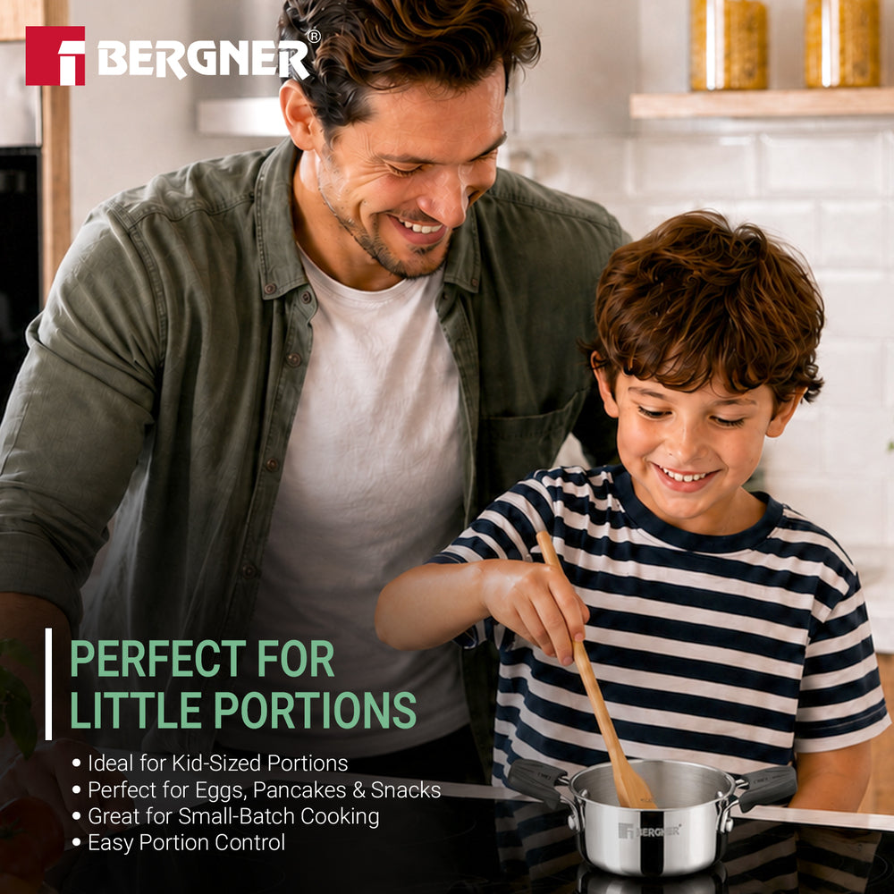 A father and son smiling while cooking together in a bright kitchen, with the Bergner logo in the top left and text on the left reading 'PERFECT FOR LITTLE PORTIONS' with product benefits below.